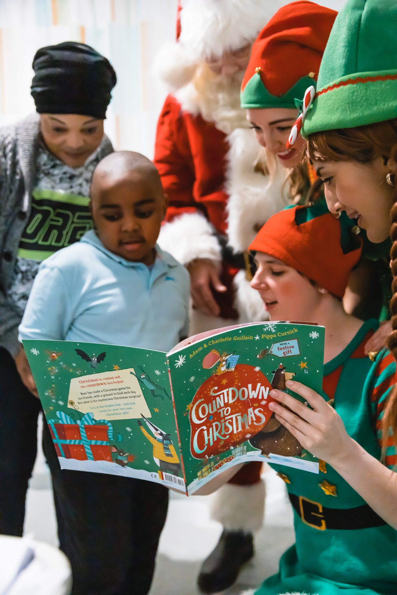 Gosh Patient Redeemer Reads A Story With Gosh Volunteer Elves And Father Christmas